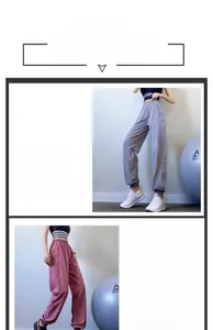 Detail of high waisted sports pants with elastic waistband and side zipper pockets