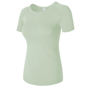 T-shirt de yoga vert menthe ajusté et respirant en tissu sans couture évacuant l'humidité