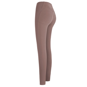 Hoge taille yoga legging in oudroze met perzik liftend effect en compressie pasvorm