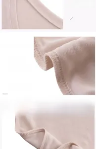 Detail of premium stitching on a beige yoga top with smooth knit fabric texture