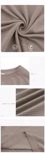Detail showing waffle knit texture and round neck stitching of the athletic top