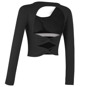 Black long sleeve crop top with open back cutout and twisted hem detail for fitness