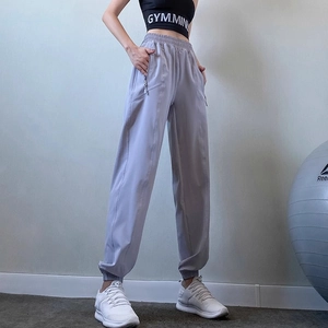 High-waisted loose fit jogger pants in grey purple with side zipper pockets