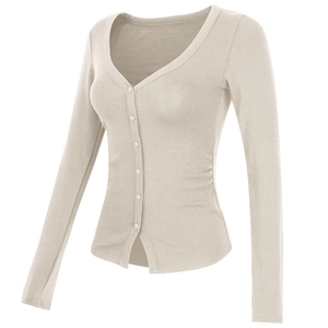 Close-up of beige slim fit cardigan featuring deep V-neck and ruched side details