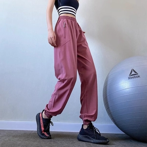 Women's high waist rose pink jogger pants with side zip pockets and cuffed ankles