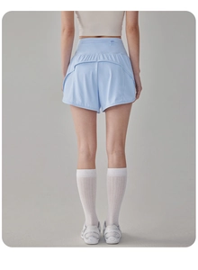 Vue arrière du short de sport bleu clair avec taille haute et poche zippée invisible