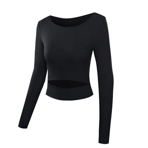 Women's black long sleeve cropped sports top with front cutout and ribbed texture