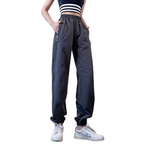 Women's dark grey high waist quick-dry joggers with side zipper pockets and drawstring