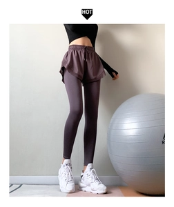 Dettaglio dei leggings sportivi viola 2 in 1 con gonna e coulisse in vita elasticizzata