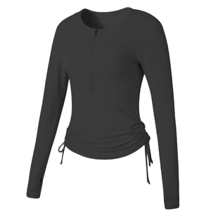 Haut de yoga noir slim avec demi-zip, cordons de serrage latéraux et passe-pouces