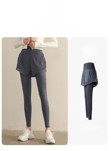 Détail du legging 2-en-1 taille haute avec contrôle du ventre et poche latérale de yoga