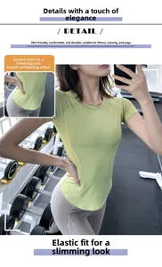 Detail of light green fitness t-shirt with curved hem and slim fit raglan sleeves