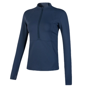 Navy blue slim-fit athletic top with half-zip collar and thumbholes for yoga or fitness