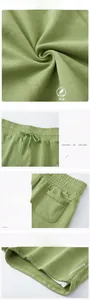 Detail of high-waist athletic shorts featuring an elastic drawstring waistband and inner lining