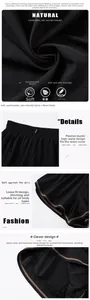 Detail of high-waisted black sports shorts with elastic pleated waistband and anti-chafing liner