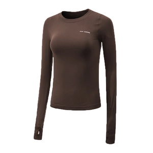 Detail of brown slim-fit sports top with side mesh vents and thumb hole sleeves