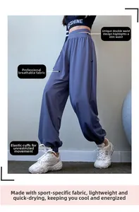 Λεπτομέρεια joggers με διπλή μέση, ελαστικά ρεβέρ και κουμπιά στο πλάι για προπόνηση
