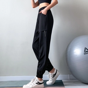 Women's black high-waisted cargo joggers with side stripes for gym and casual wear