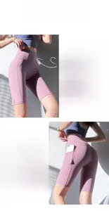 Détail du short de yoga violet à taille haute avec poches latérales et tissu gainant
