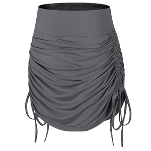 High-waisted dark grey running skorts with side drawstrings and pleated workout design