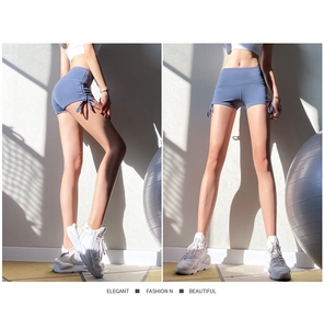 Détail du short de yoga bleu-gris taille haute avec cordons de serrage réglables