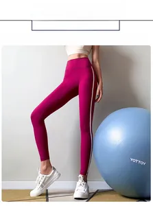 Side view of high-waist fuchsia yoga leggings with white stripes and body-shaping fit
