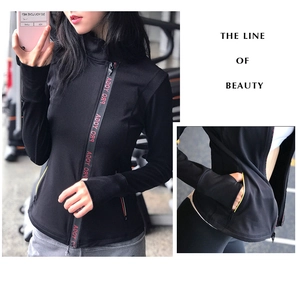 Detail of slim fit sports jacket with asymmetric zipper and thumbholes in sleeve cuffs