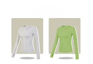 Detail of slim fit sports jacket with hood and thumbholes for yoga and running