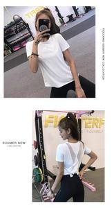 Detail of white quick-dry fitness t-shirt with grey mesh back and stylish knot design