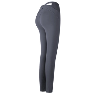 Pantalon de yoga gris foncé à taille haute avec détails croisés au dos pour le sport