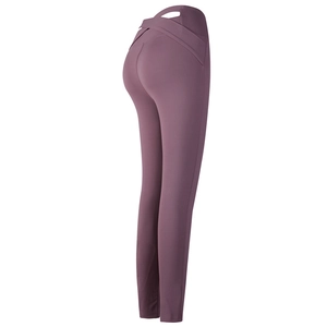 Pantalon de yoga rose poudré à taille haute croisée avec effet push-up fessier