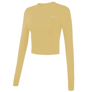 Ginger yellow cropped yoga top with long sleeves and logo detail for fitness wear