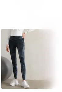Detail view of high waisted tie-dye yoga pants with 3D cut for butt lifting effect
