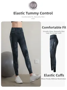 Detail view of high waist tie-dye yoga leggings with elastic tummy control and tapered cuffs