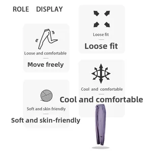 Détails du jogging violet ample montrant le tissu à séchage rapide et l'ourlet à cordon