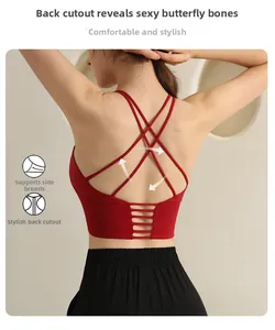 Detail of red sports bra featuring criss-cross straps and hollow-out back design