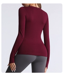 Slim fit burgundy long sleeve yoga top with breathable elastic fabric for running and gym