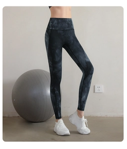 Detail of high waist tie-dye yoga leggings with squat-proof fabric and stitching