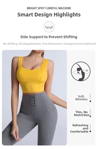 Detail of high-waist grey yoga leggings with crossover waist design and side pockets