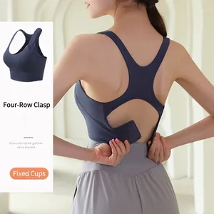 Reggiseno sportivo blu navy con dorso a vogatore e chiusura posteriore a quattro ganci