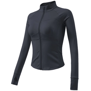 Close-up of slim-fit yoga jacket with thumbholes and standing collar in charcoal grey