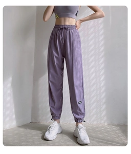 Détails du jogging sport lilas avec taille haute élastique et chevilles ajustables