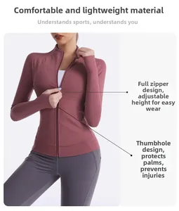 Detail of slim-fit yoga jacket with stand collar and thumbholes in dusty rose color