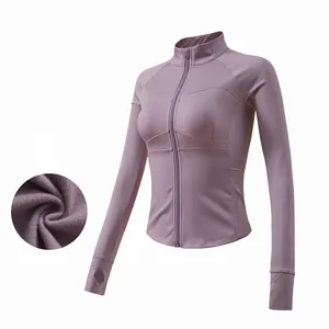 Detail of slim fit purple yoga jacket with fleece lining and thumbholes for winter