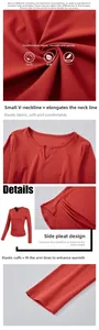 Close-up of V-neckline and side ruching details on red Modal stretch yoga top