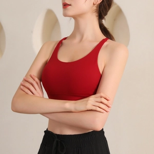 Women's burgundy high-impact sports bra with racerback design for gym and yoga training