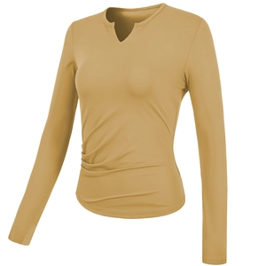 Women's slim fit long sleeve yoga top with V-neck and ruched side in mustard yellow