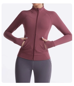 Detailed view of the stand-up collar and full zipper on a slim-fit yoga jacket with thumbholes