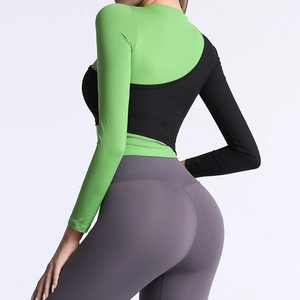 Ensemble fitness femme avec haut à manches longues bicolore et legging taille haute