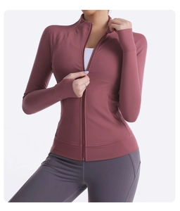 Close-up of stand-up collar yoga jacket with full zipper and functional thumbhole sleeves